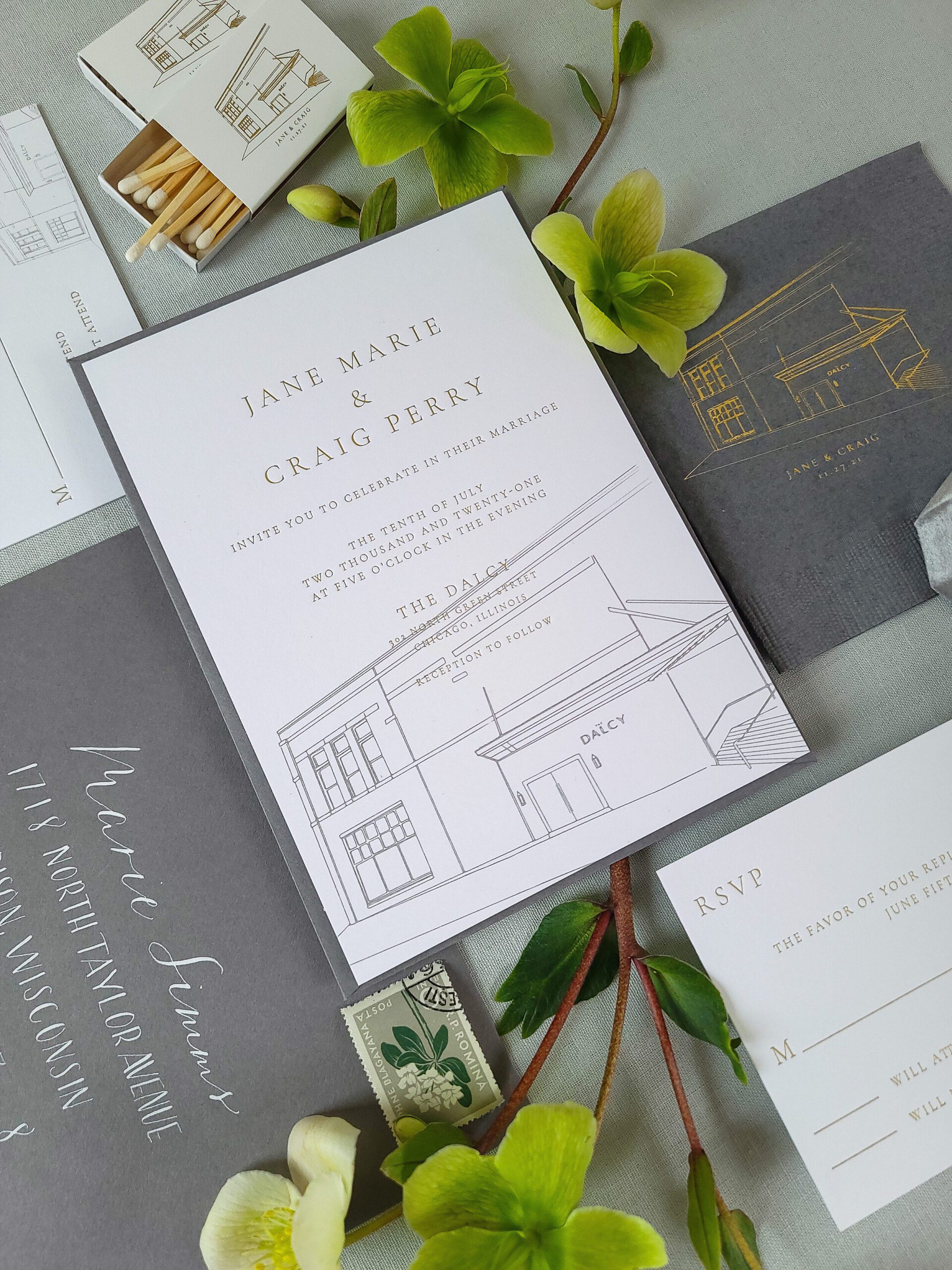 White wedding invitation with an illustration of The Dalcy and a gray envelope