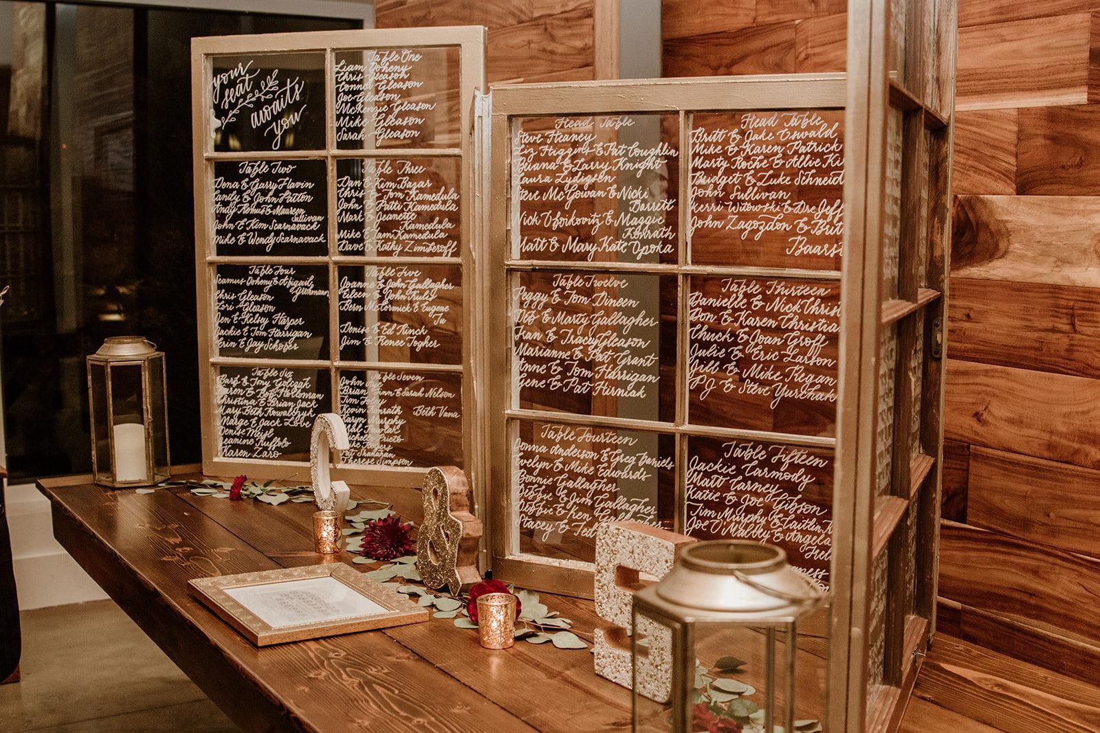 Vintage window seating chart displayed at Pear Tree Estate