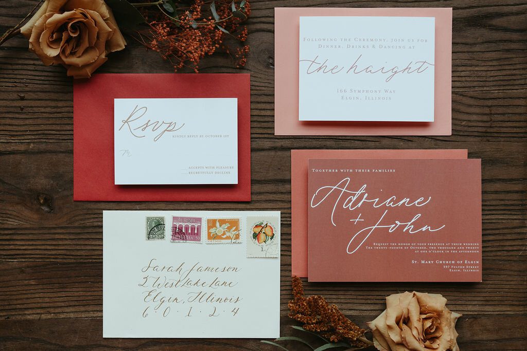 Persimmon and blush wedding invitations with blue cards and vintage postage