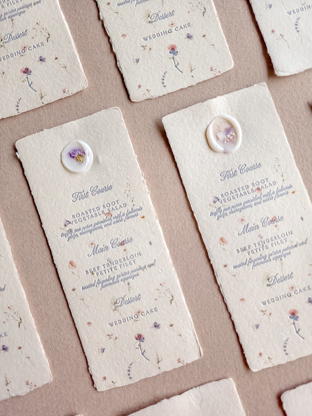 Wedding invitation cards and envelopes finished with wax seals
