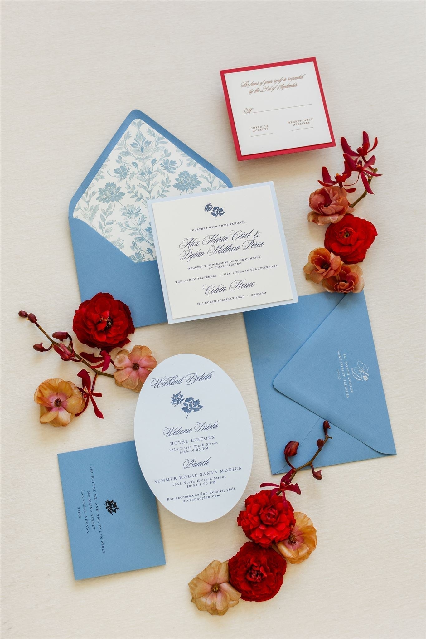 Blue and red wedding invitation suite with a coordinated monogram